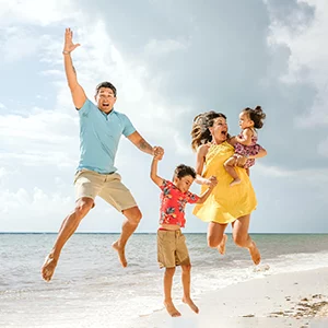 Wellness Center Frisco TX Shannyn Pearce And Justin Pearce With Family On Beach